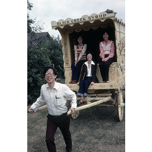 Man pulls three women in a cart at Black Creek Farms in upstate New York