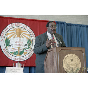 Joseph Warren speaking at a discussion on corporate responsibility