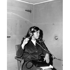 A student taking a hearing test at the Speech & Hearing Clinic