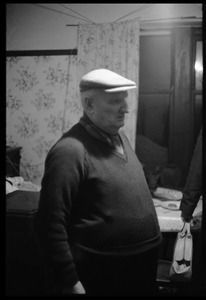 Portrait of an older man in a Scottish pub