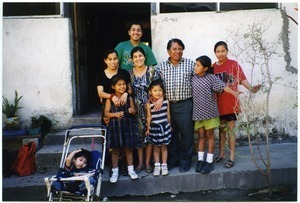 Jacinto Mutas Ventura (Sebastian's son), his wife and 7 children in front of their home