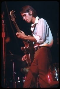 Bob Weir (Grateful Dead) performing on guitar at the Woodstock Festival
