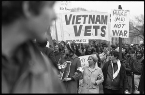 Protesters at the Counter-inaugural demonstrations, 1969, marching from the circus tent with banners for Vietnam Vets and sign 'Make me, not war'