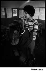 Woman (mother?) and young girl student at the Liberation School