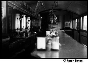 Interior view looking down the counter at Joe Gile's Bungalow diner