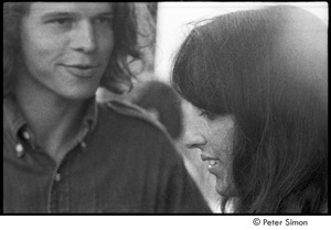 Joan Baez with unidentified man at the Newport Folk Festival