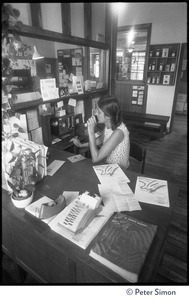Receptionist at her desk, Erewhon Food Coop warehouse, Farnsworth Street