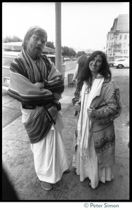 Bhagavan Das and unidentified woman on the street outside the Winterland Ballroom