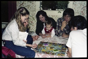 Playing a board game at Christmas time, Montague Farm commune