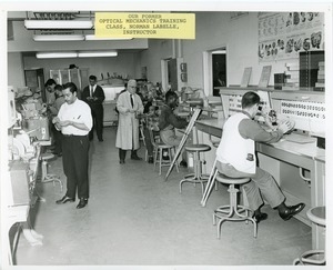 Norman Labelle teaching an optical mechanics training class