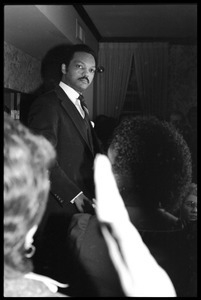 Jesse Jackson at the podium, addressing supporters