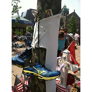 Blue sneakers at Copley Square Memorial