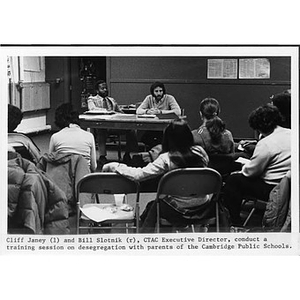 Cliff Janey (l) and Bill Slotnick (r), CTAC executive director, conduct a training session on desegregation with parents of Cambridge Public Schools.