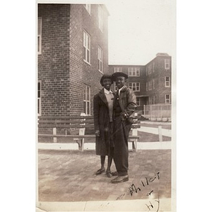 Hyacinth and Jean Miller pose together in front of the Lenox Street Projects