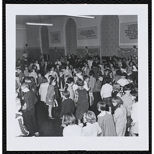 Children dance at a Boys' Club of Boston St. Patrick's Day inaugural ball and exercises event