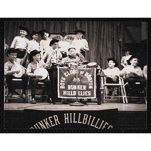 The Bunker Hillbillies perform on a stage with "Major Mudd," played by Edward T. McDonnell, the host of the "Major Mudd" show