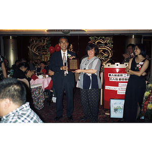 Plaque presentation at the Chinese Progressive Association's 20th Anniversary and the Workers' Center's 10th Anniversary Celebration