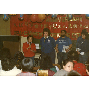 Suzanne Lee and others speaking at a Chinese Progressive Association event