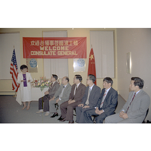 Suzanne Lee stands addressing seated members for the Consulate General of the People's Republic of China during a welcome party held for the visitors