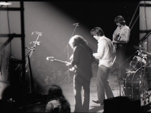 Grateful Dead concert at Springfield Civic Center: band in performance: Jerry Garcia, Bob Weir, and Phil Lesh (l. to r.)