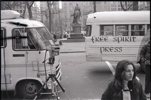 Free Spirit Press bus parked during interview by Channel 5 news