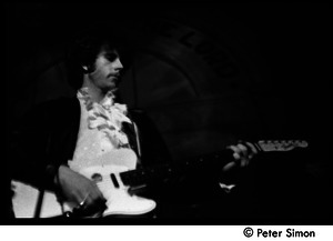 The Byrds and Flying Burrito Brothers performing at the Boston Tea Party: Chris Hillman playing guitar (partial double exposure)