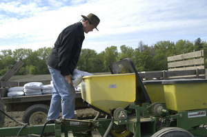 Lazy Acres Farm (Zuchowski Farm): Allan Zuchowski loading fertilizer for his corn crop