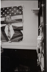 Young Americans for Freedom (YAF) office: rubber chicken hanging in front of poster of William F. Buckley
