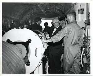 Mark Bortman inspecting an iron lung