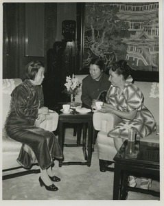 Shirley Graham Du Bois talking with two unidentified woman