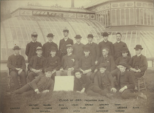Class photo of 1889 taken in front of Durfee Plant House during freshman year