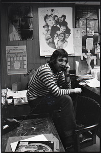 Charles Laquidara on the phone in the WBCN news room