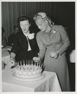 Lighting candles on a cake