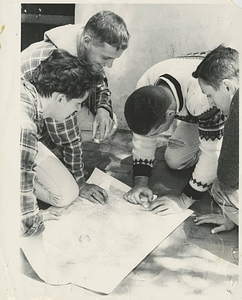 Students studying a map at Freshman Camp
