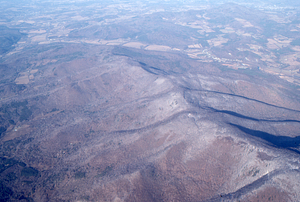 Oblique aerial photos accompanying 22 Dec 1994 Col-East air photo mission. 18. Northern end of Taconic Range Crest in North Petersburgh, NY.