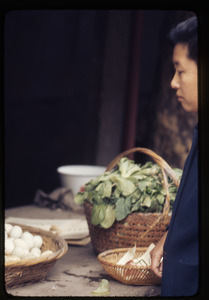 Shanghai market -- man with eggs