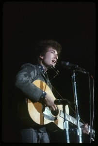 Bob Dylan performing on stage