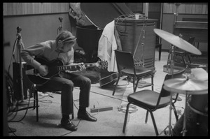 Stephen Stills in Wally Heider Studio 3 playing guitar during production of the first Crosby, Stills, and Nash album