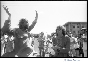 Peter Simon (right) and Bhagavan Das dancing energetically at Sonoma State University