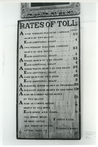 Toll rates - museum sign