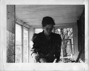 Tully (woman working on the front porch), Montague Farm Commune