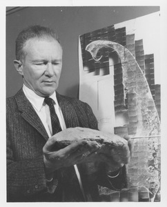 Harold Theodore Uhr Smith holding geological specimen