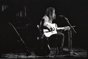 Neil Young performing at the Music Hall