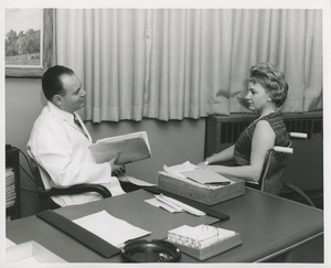 Mrs. Frances Marsala seated in her wheelchair at a doctor's office