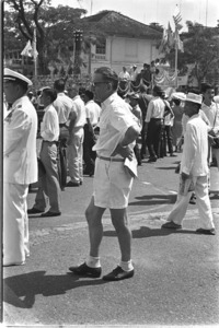 European colonist in traditional colonial attire in Saigon.