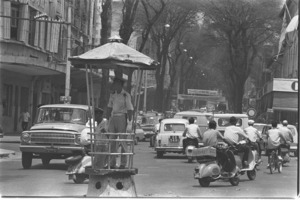 Saigon noon traffic on Boulevard Le Loi.