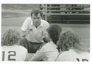 Coach Herb Zettl Leading Team Huddle