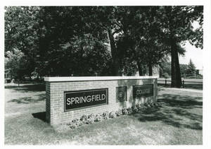 The Springfield College sign in front of the Richard B. Flynn Campus Union, ca. 1990-2000