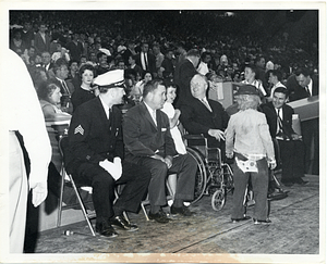 Mayor John F. Collins with a child in costume