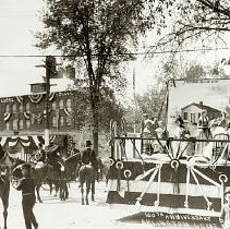 Parade float with 1st school house